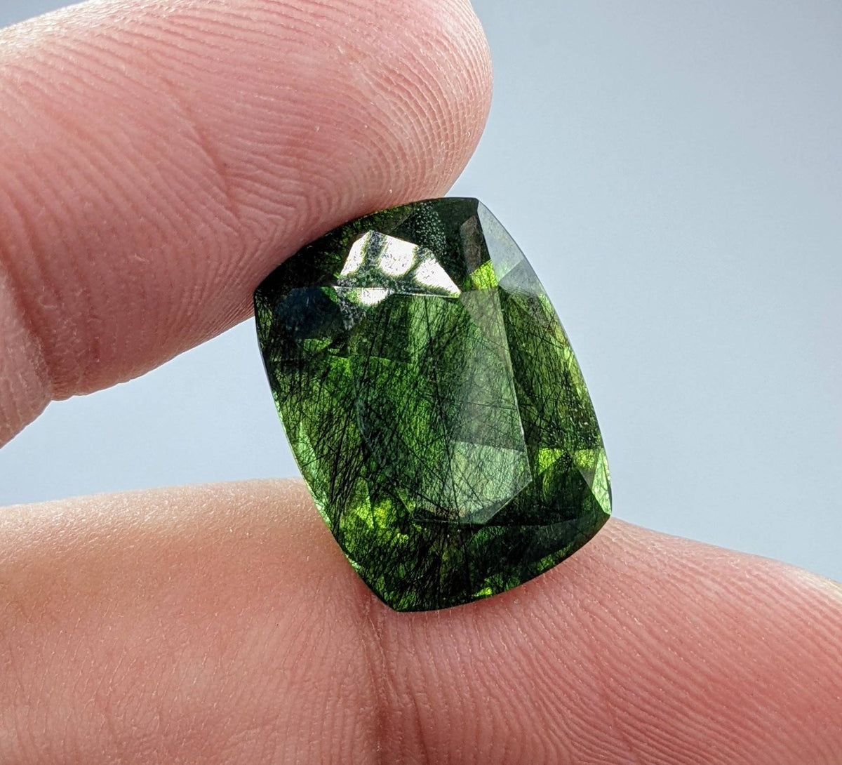 Rutile peridot Gem Peridot containing hairlike inclusions Ludwigite from Mansehra KP Pakistan, 20 carats