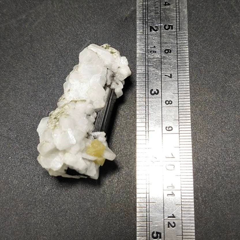 Rare yellow microlite crystal on black tourmaline with Albite , 30 grams