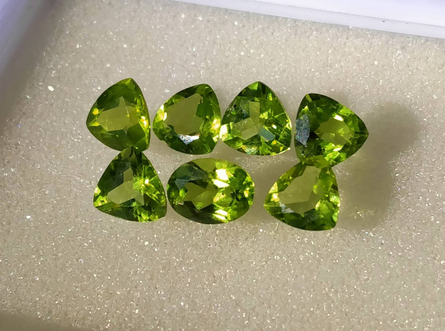 ARSAA GEMS AND MINERALSNatural top quality faceted 11 carats beautiful trillion shape calibrated green peridot gems - Premium from ARSAA GEMS AND MINERALS - Just $100.00! Shop now at ARSAA GEMS AND MINERALS