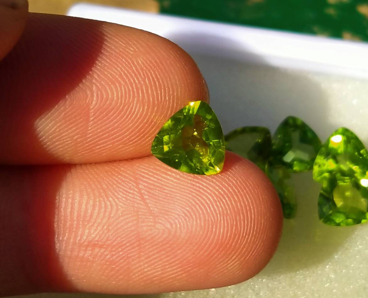 ARSAA GEMS AND MINERALSNatural top quality faceted 11 carats beautiful trillion shape calibrated green peridot gems - Premium from ARSAA GEMS AND MINERALS - Just $100.00! Shop now at ARSAA GEMS AND MINERALS
