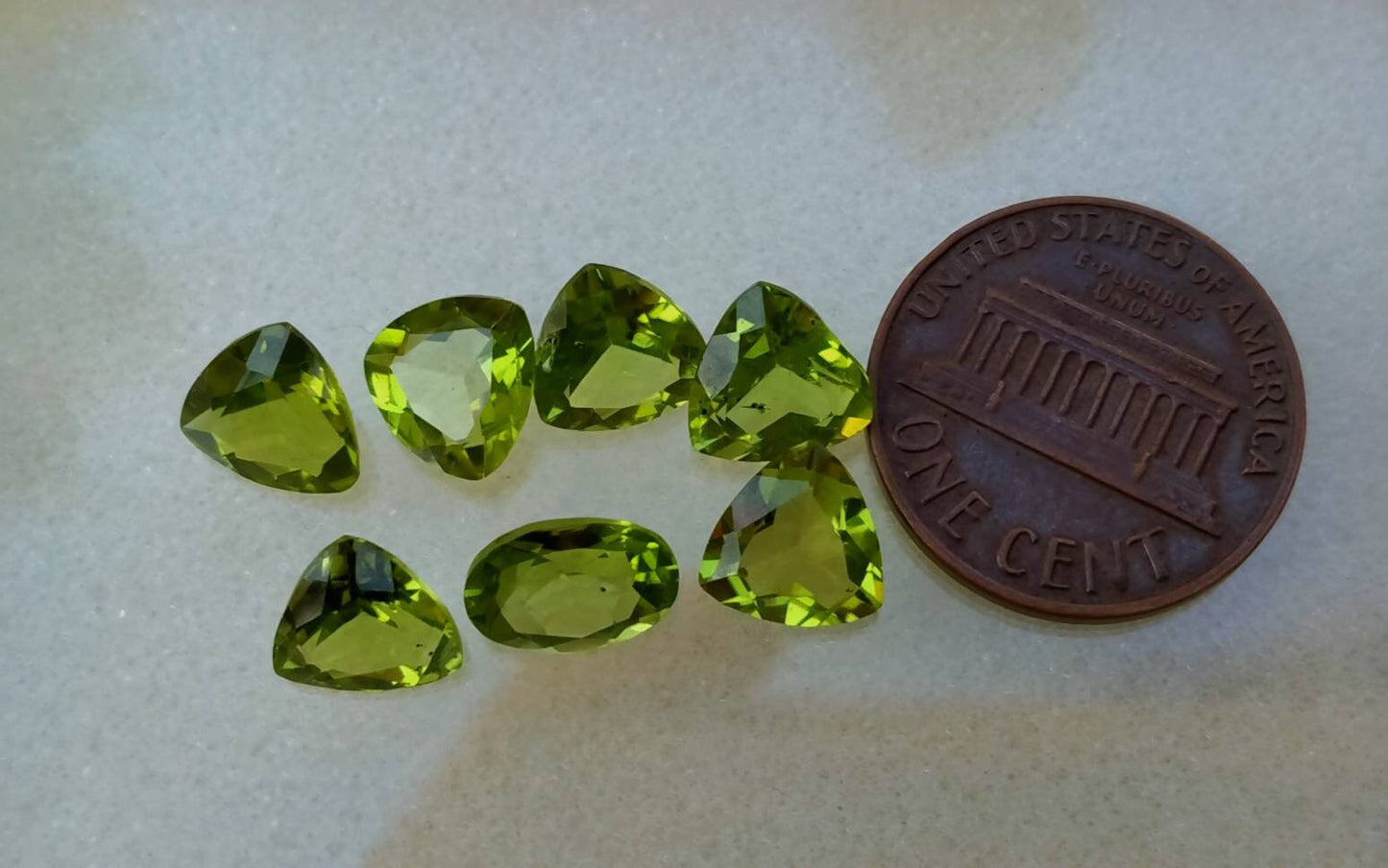 ARSAA GEMS AND MINERALSNatural top quality faceted 11 carats beautiful trillion shape calibrated green peridot gems - Premium from ARSAA GEMS AND MINERALS - Just $100.00! Shop now at ARSAA GEMS AND MINERALS