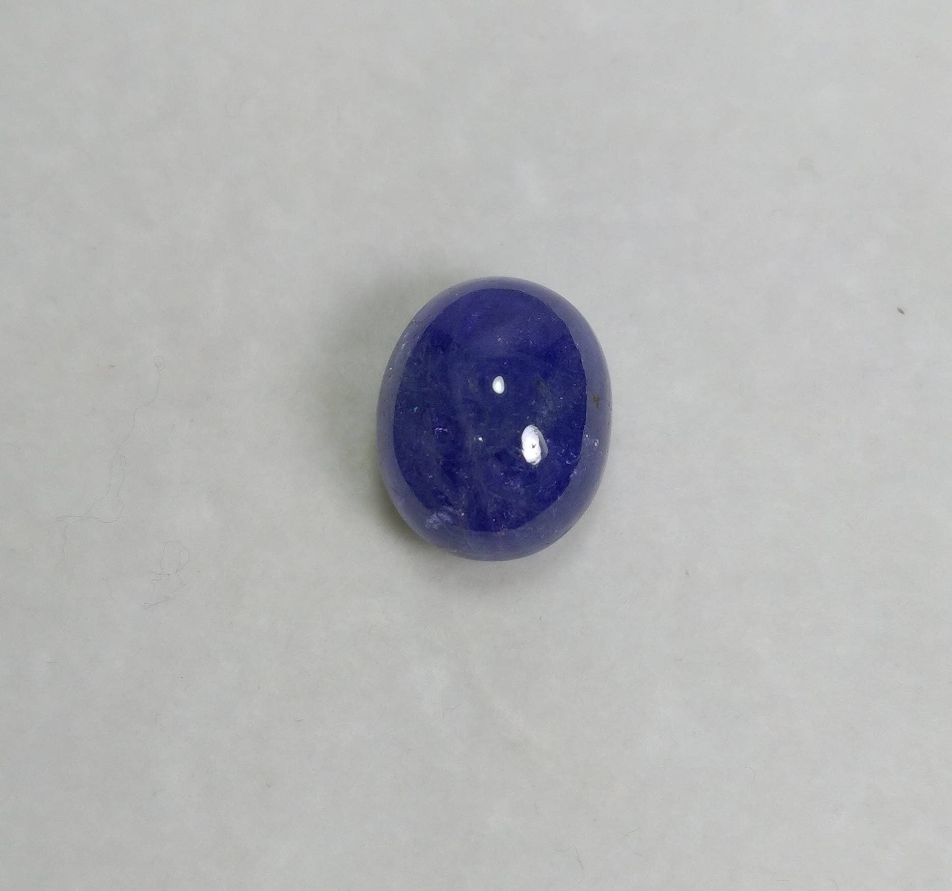 ARSAA GEMS AND MINERALSNatural high grade 14 carats blue oval shape tanzanite cabochon - Premium  from ARSAA GEMS AND MINERALS - Just $30.00! Shop now at ARSAA GEMS AND MINERALS