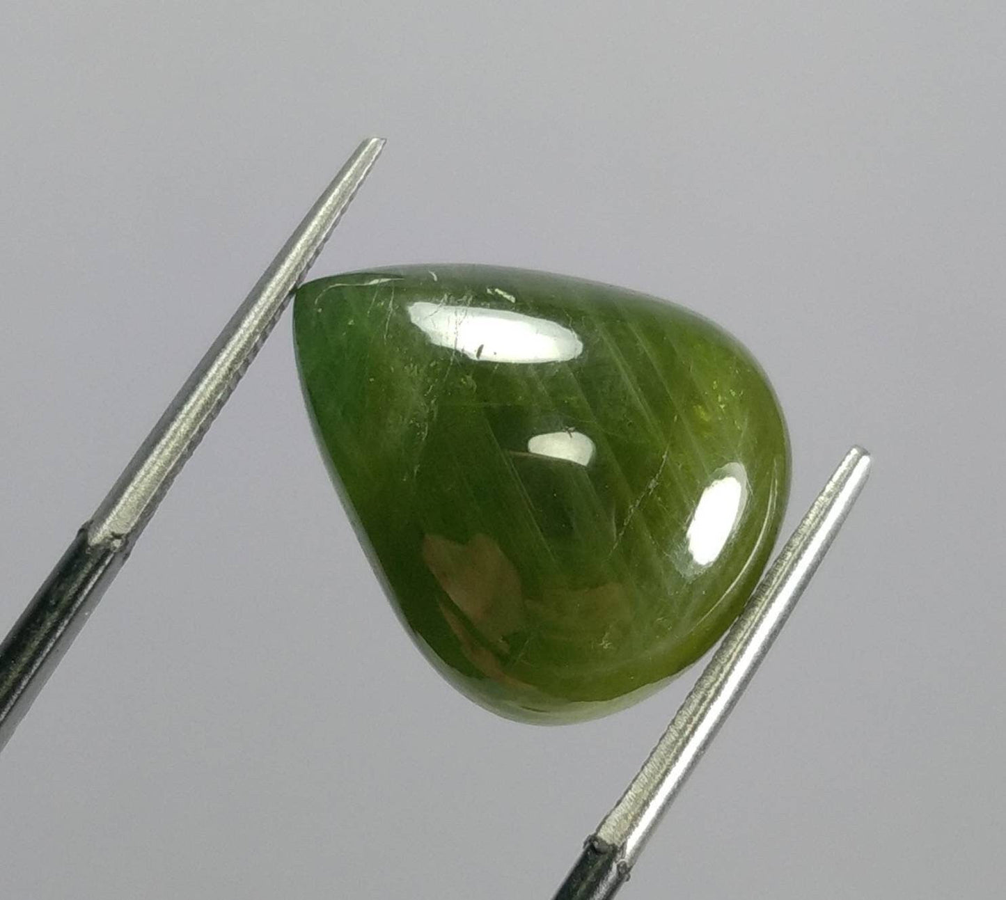 ARSAA GEMS AND MINERALSNatural fine quality beautiful 18 carat pear shape partially star green sapphire Cabochon - Premium from ARSAA GEMS AND MINERALS - Just $35.00! Shop now at ARSAA GEMS AND MINERALS