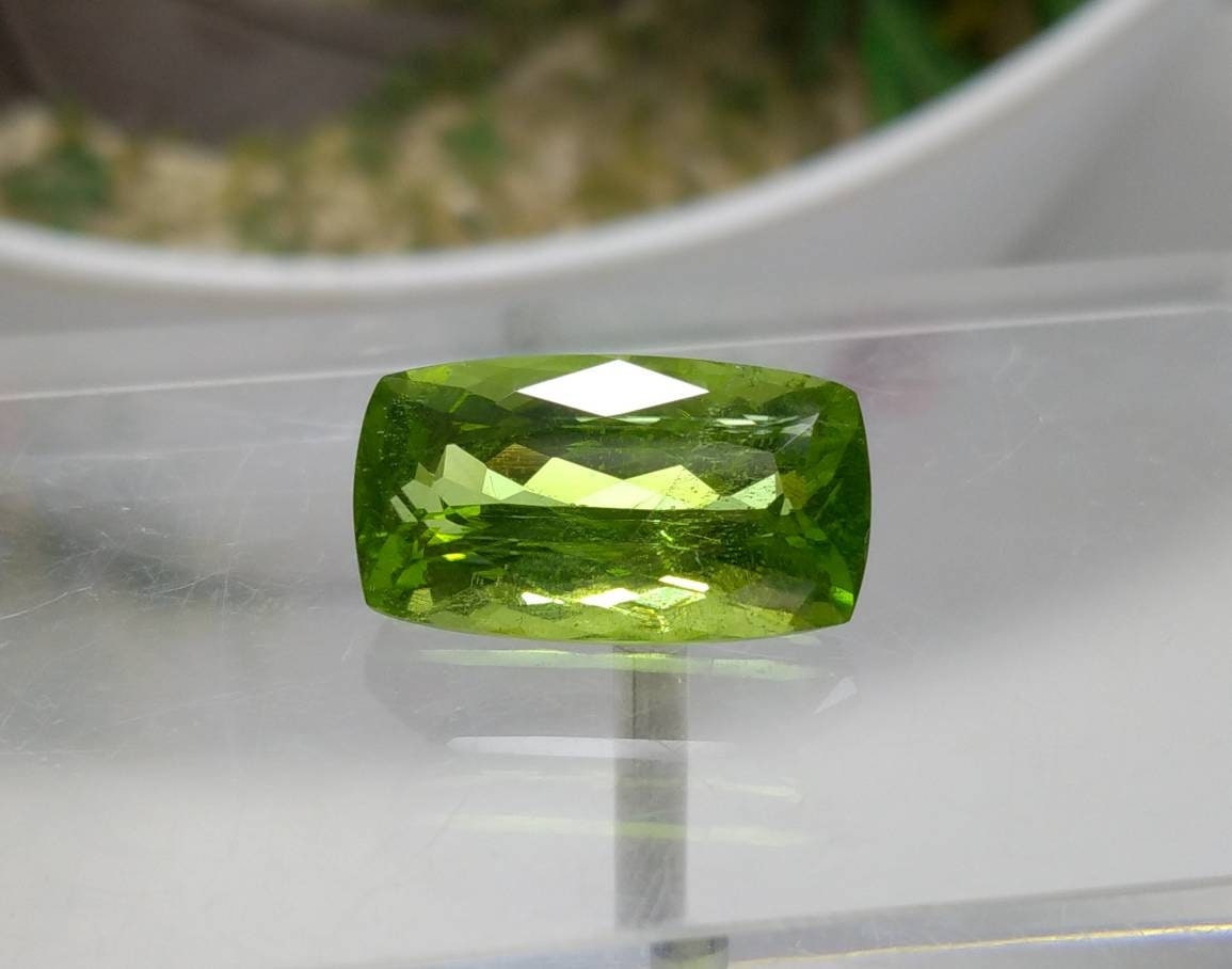 ARSAA GEMS AND MINERALSNatural high quality beautiful 15 carats green faceted radiant shape peridot gem - Premium from ARSAA GEMS AND MINERALS - Just $335.00! Shop now at ARSAA GEMS AND MINERALS