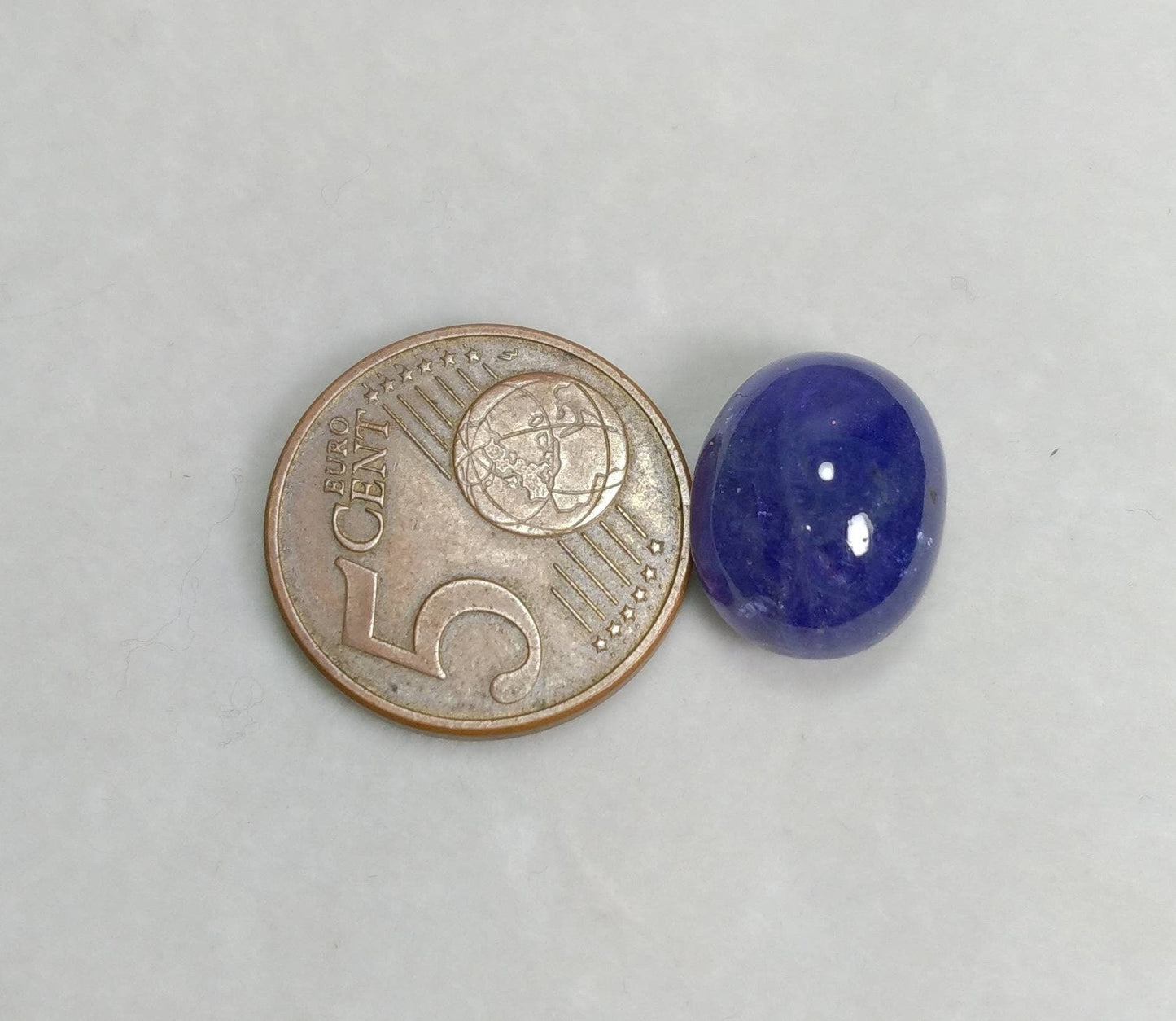 ARSAA GEMS AND MINERALSNatural high grade 14 carats blue oval shape tanzanite cabochon - Premium from ARSAA GEMS AND MINERALS - Just $30.00! Shop now at ARSAA GEMS AND MINERALS