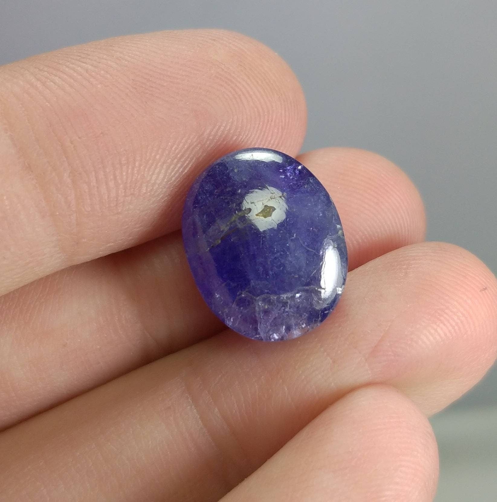 ARSAA GEMS AND MINERALSNatural high grade 14 carats blue oval shape tanzanite cabochon - Premium  from ARSAA GEMS AND MINERALS - Just $30.00! Shop now at ARSAA GEMS AND MINERALS