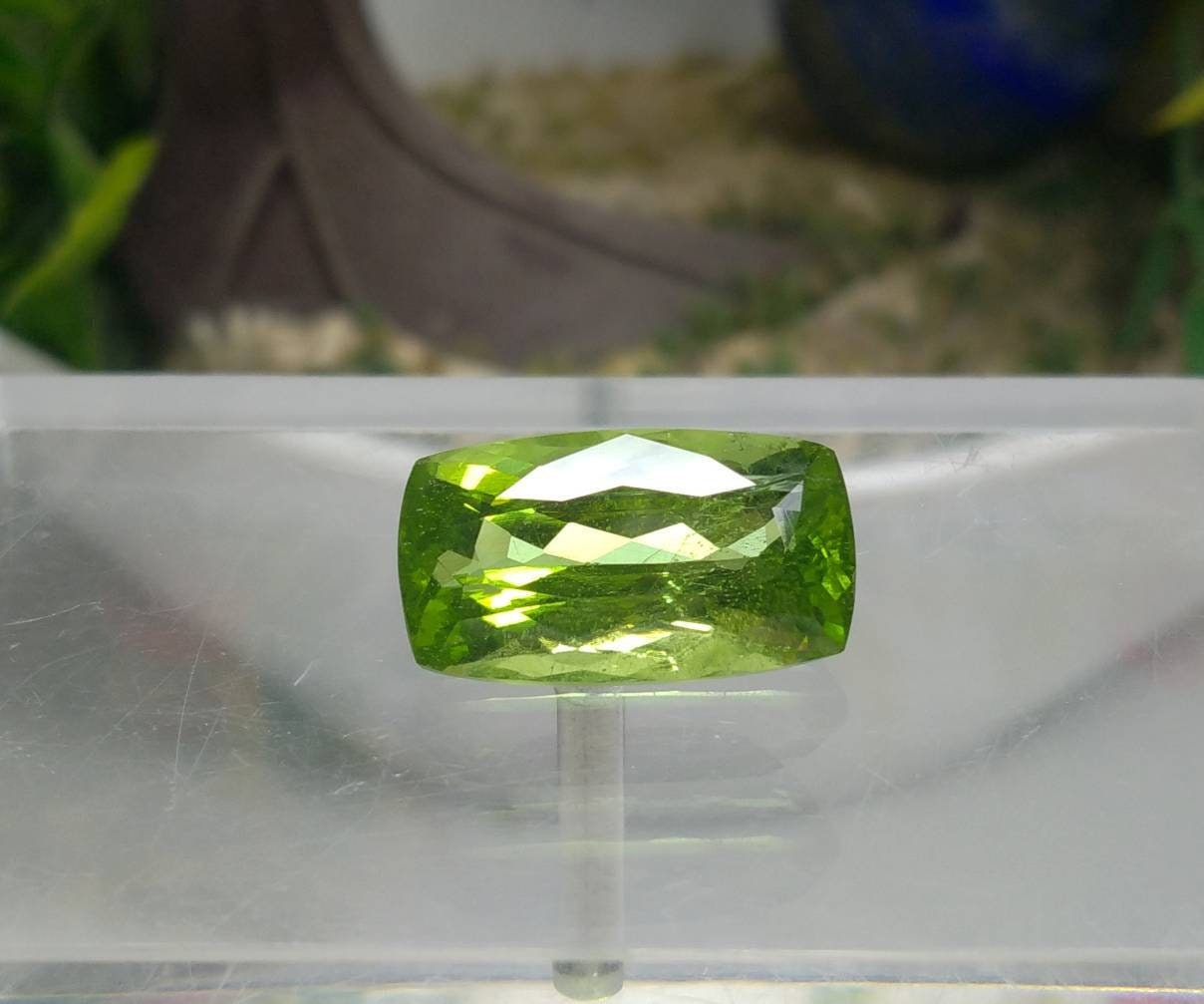 ARSAA GEMS AND MINERALSNatural high quality beautiful 15 carats green faceted radiant shape peridot gem - Premium from ARSAA GEMS AND MINERALS - Just $335.00! Shop now at ARSAA GEMS AND MINERALS