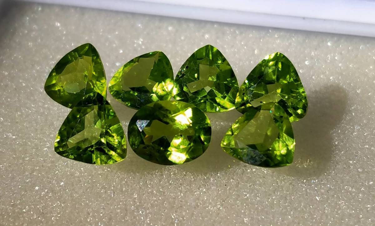 ARSAA GEMS AND MINERALSNatural top quality faceted 11 carats beautiful trillion shape calibrated green peridot gems - Premium from ARSAA GEMS AND MINERALS - Just $100.00! Shop now at ARSAA GEMS AND MINERALS