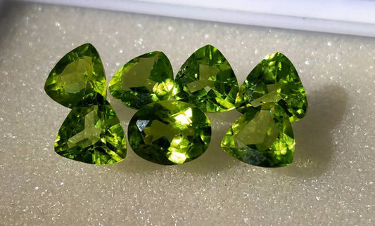 ARSAA GEMS AND MINERALSNatural top quality faceted 11 carats beautiful trillion shape calibrated green peridot gems - Premium  from ARSAA GEMS AND MINERALS - Just $100.00! Shop now at ARSAA GEMS AND MINERALS
