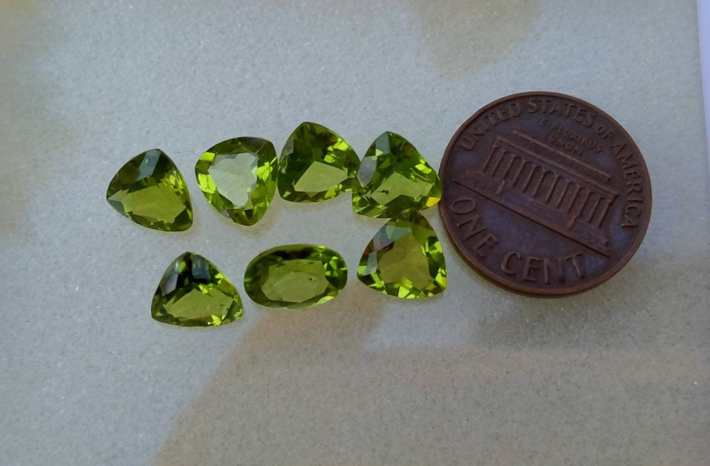 ARSAA GEMS AND MINERALSNatural top quality faceted 11 carats beautiful trillion shape calibrated green peridot gems - Premium from ARSAA GEMS AND MINERALS - Just $100.00! Shop now at ARSAA GEMS AND MINERALS
