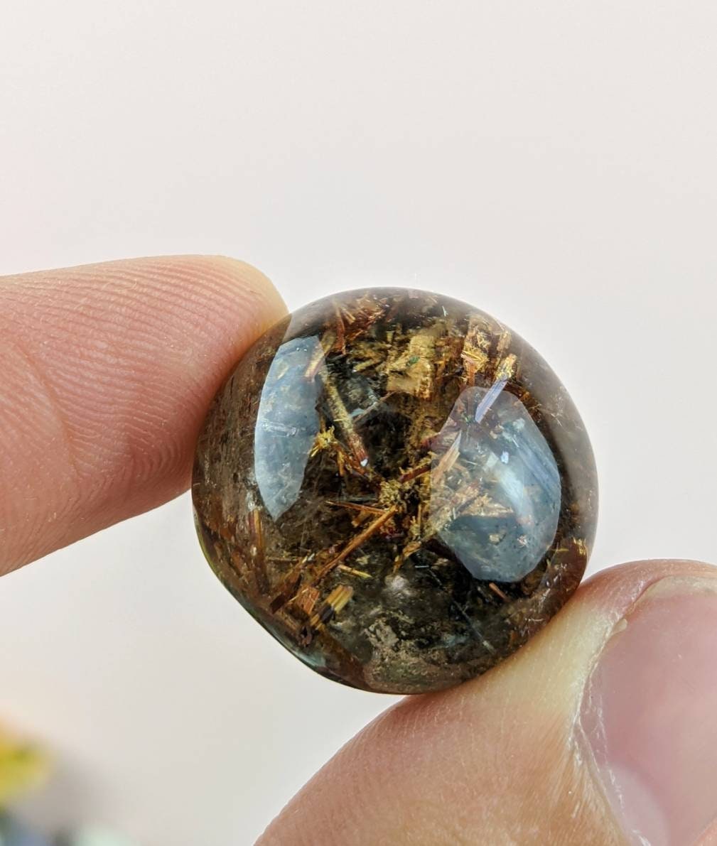 ARSAA GEMS AND MINERALSNatural fine quality nice clarity golden Rutile included cabochon from Zagi Mountain KP Pakistan, weight 11.6 grams - Premium  from ARSAA GEMS AND MINERALS - Just $40.00! Shop now at ARSAA GEMS AND MINERALS