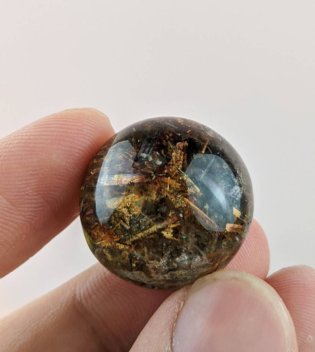 ARSAA GEMS AND MINERALSNatural fine quality nice clarity golden Rutile included cabochon from Zagi Mountain KP Pakistan, weight 11.6 grams - Premium  from ARSAA GEMS AND MINERALS - Just $40.00! Shop now at ARSAA GEMS AND MINERALS
