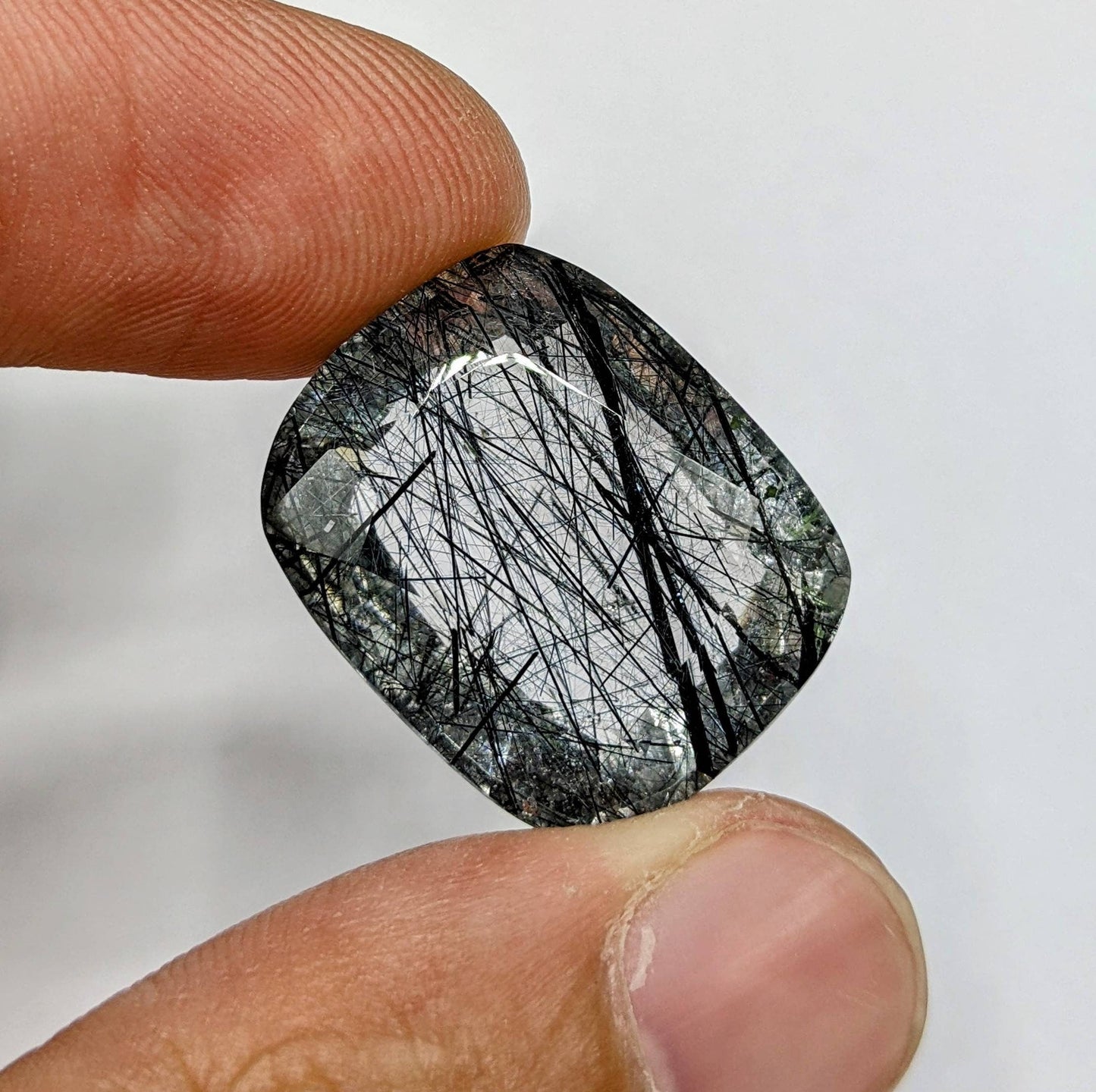 ARSAA GEMS AND MINERALSVery rare mangano Riebeckite included Quartz faceted gem. The stone was acquired from Zagi Mountains KPK Pakistan, 29.5 carats - Premium from ARSAA GEMS AND MINERALS - Just $175.00! Shop now at ARSAA GEMS AND MINERALS