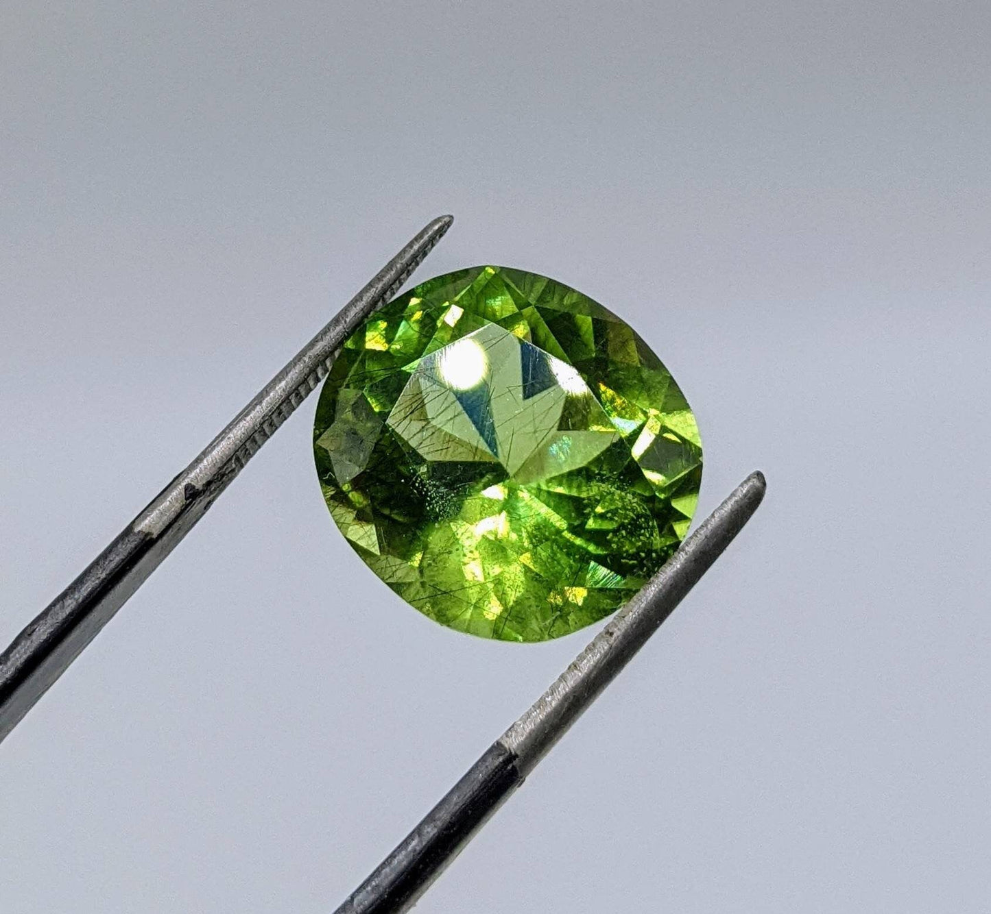 ARSAA GEMS AND MINERALSRutile peridot Gem Peridot containing hairlike inclusions Ludwigite from Mansehra KP Pakistan, 8 carats - Premium from ARSAA GEMS AND MINERALS - Just $160.00! Shop now at ARSAA GEMS AND MINERALS