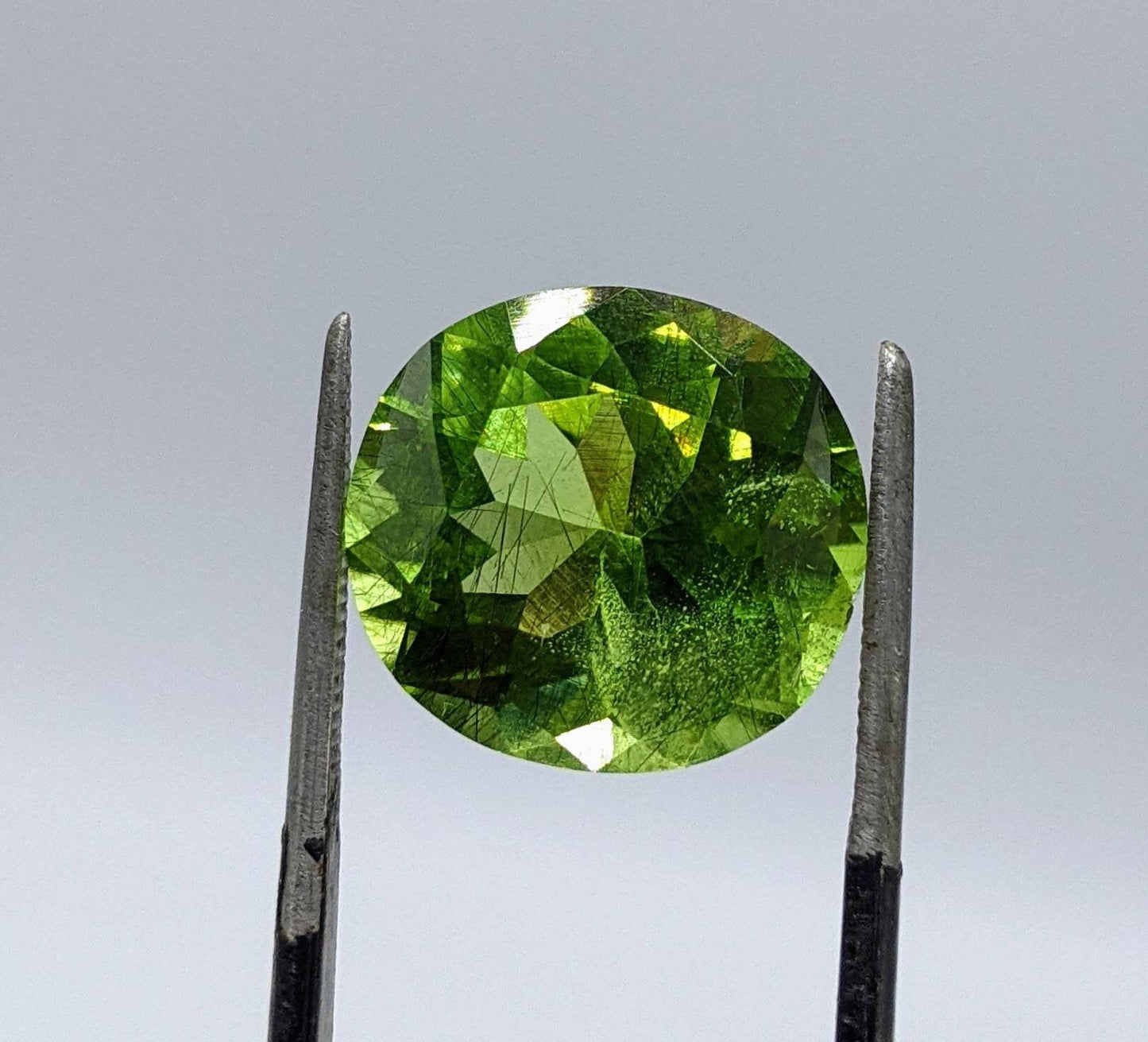 ARSAA GEMS AND MINERALSRutile peridot Gem Peridot containing hairlike inclusions Ludwigite from Mansehra KP Pakistan, 8 carats - Premium from ARSAA GEMS AND MINERALS - Just $160.00! Shop now at ARSAA GEMS AND MINERALS