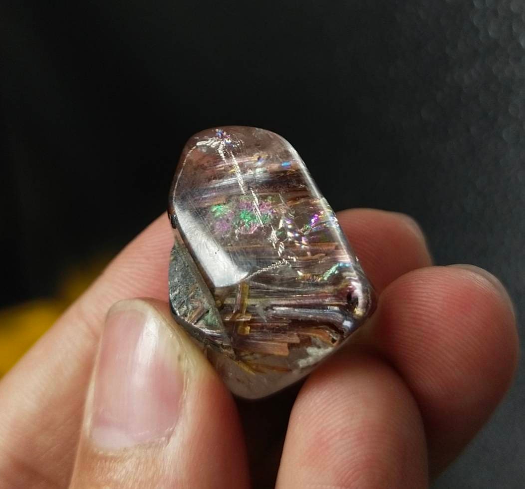 ARSAA GEMS AND MINERALSNatural rutile quartz with hematite inclusion polished tumble with nice rainbow, 13.6 grams - Premium from ARSAA GEMS AND MINERALS - Just $40.00! Shop now at ARSAA GEMS AND MINERALS
