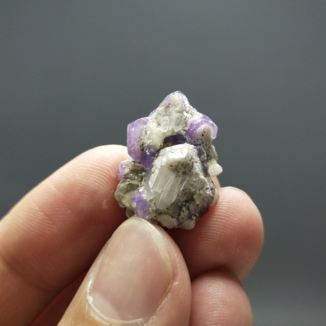 ARSAA GEMS AND MINERALSUv reactive pink apatite crystal on matrix on albite with quartz and muscovite, 4.9 grams - Premium from ARSAA GEMS AND MINERALS - Just $25.00! Shop now at ARSAA GEMS AND MINERALS