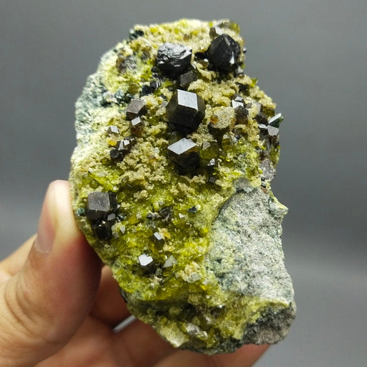 ARSAA GEMS AND MINERALSAndradite garnet crystal on matrix on albite with green epidote and magnetite from Pakistan, 209 grams - Premium  from ARSAA GEMS AND MINERALS - Just $150.00! Shop now at ARSAA GEMS AND MINERALS