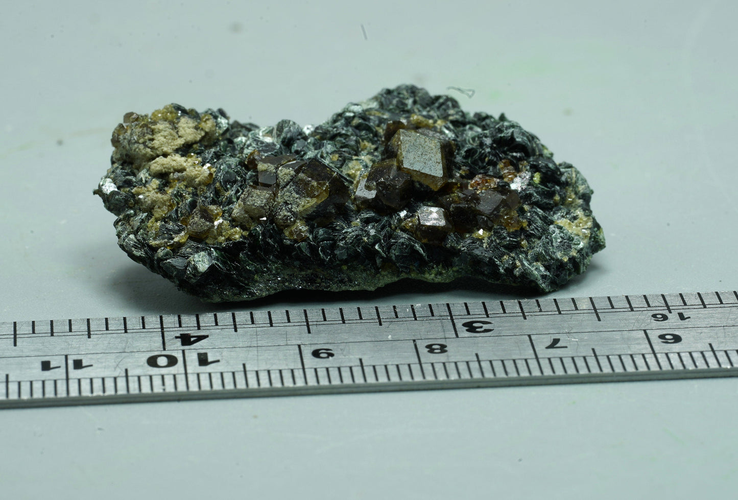 ARSAA GEMS AND MINERALSAndradite garnet crystal on matrix with mica from Pakistan, 18.2 grams - Premium from ARSAA GEMS AND MINERALS - Just $40.00! Shop now at ARSAA GEMS AND MINERALS