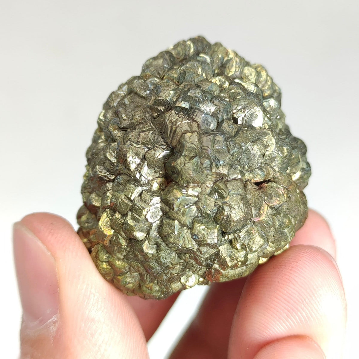 Natural golden Marcasite crystal with rainbow effect on surface from Pakistan, 80 grams