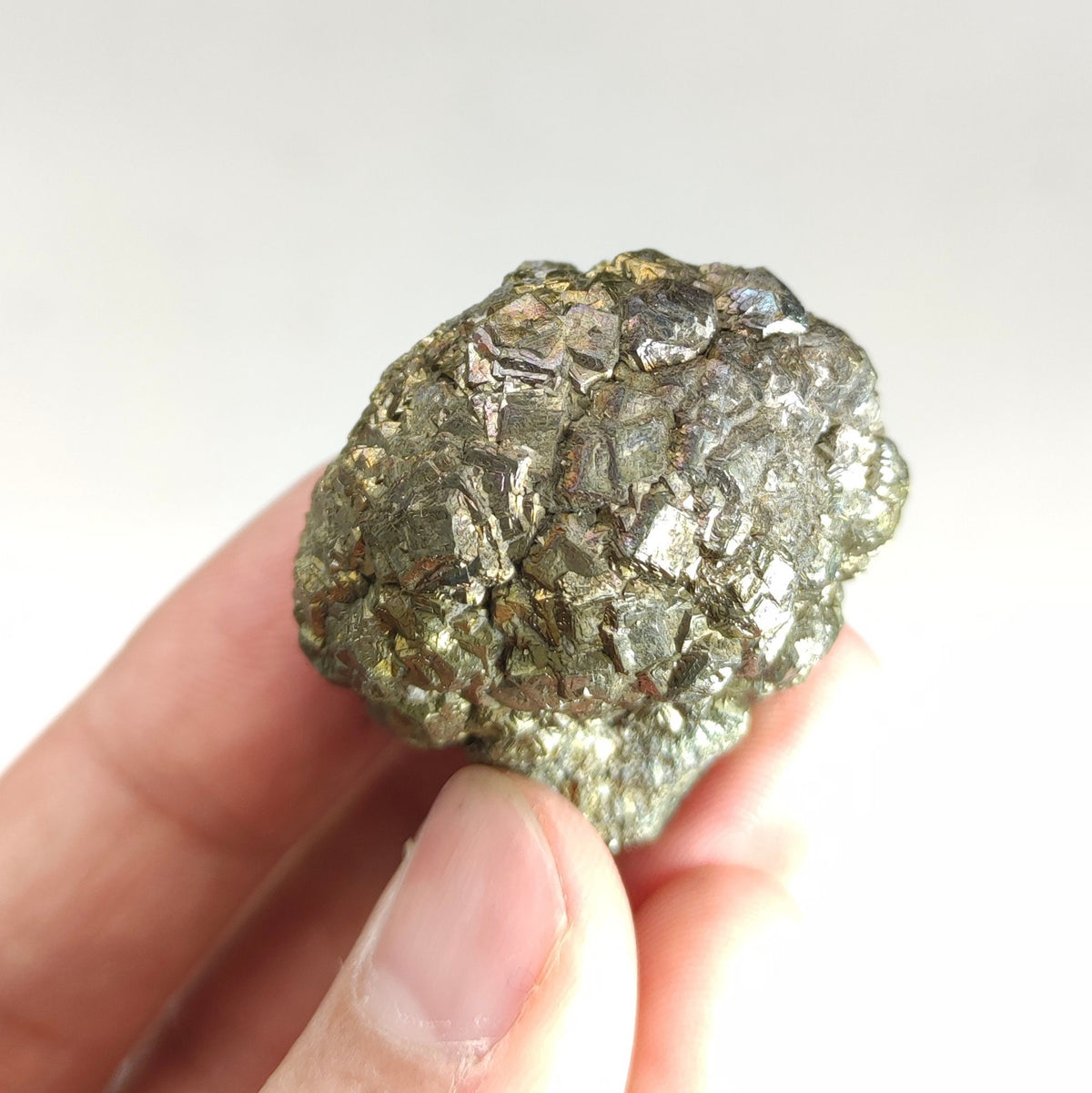 Natural golden Marcasite crystal with rainbow effect on surface from Pakistan, 77.7 grams