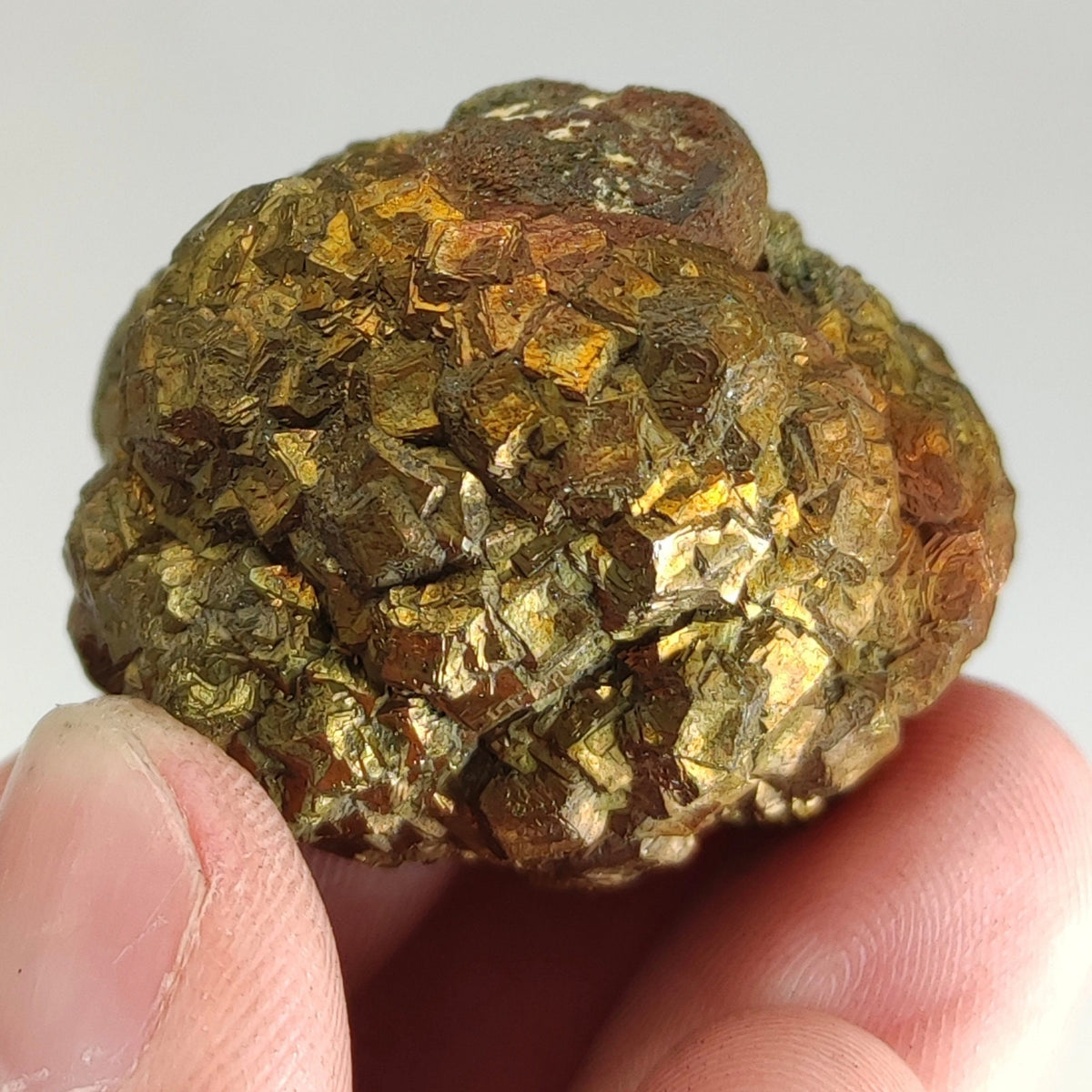 Natural golden Marcasite crystal with rainbow effect on surface from Pakistan, 84.7 grams
