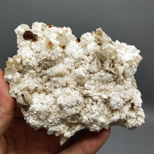 Quartz Crystal with Red Spessartine Garnet, Albite and Muscovite from Pakistan