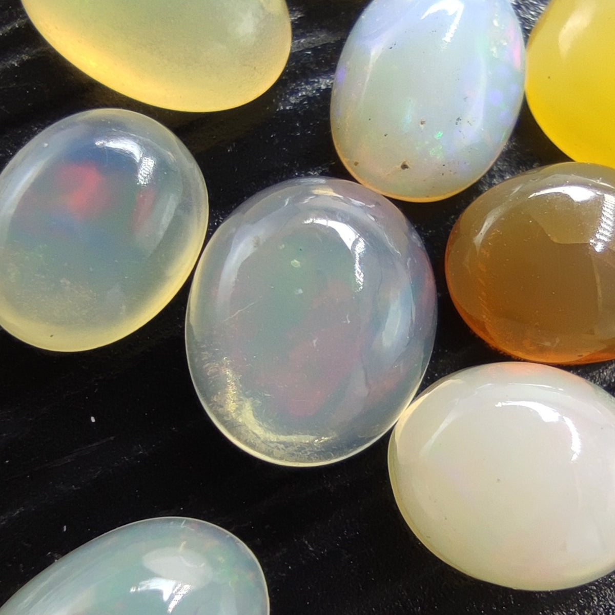 Natural small lot small sizes oval shapes fire opal Cabochons, 31 pieces, 10 carats