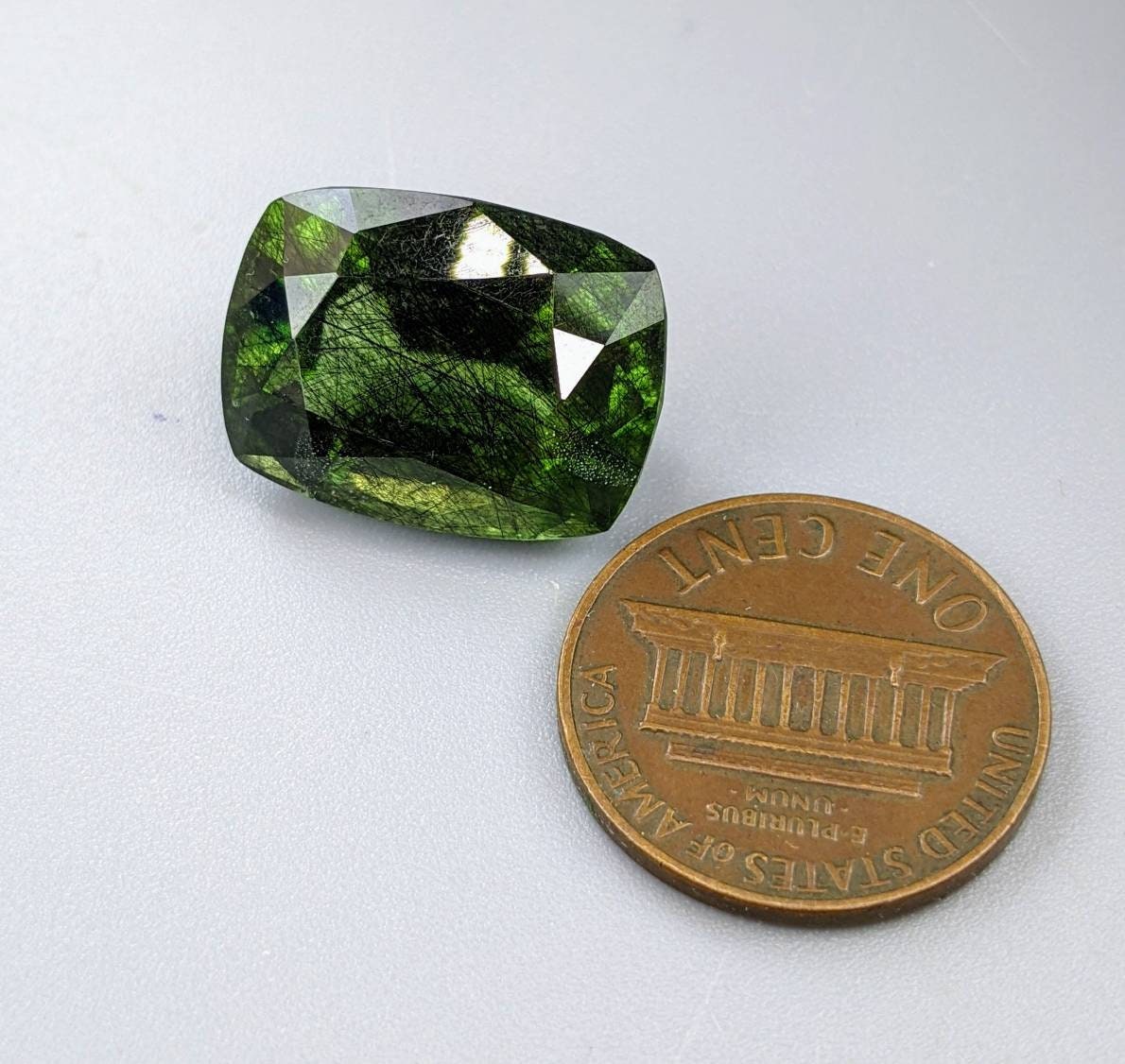 Rutile peridot Gem Peridot containing hairlike inclusions Ludwigite from Mansehra KP Pakistan, 20 carats