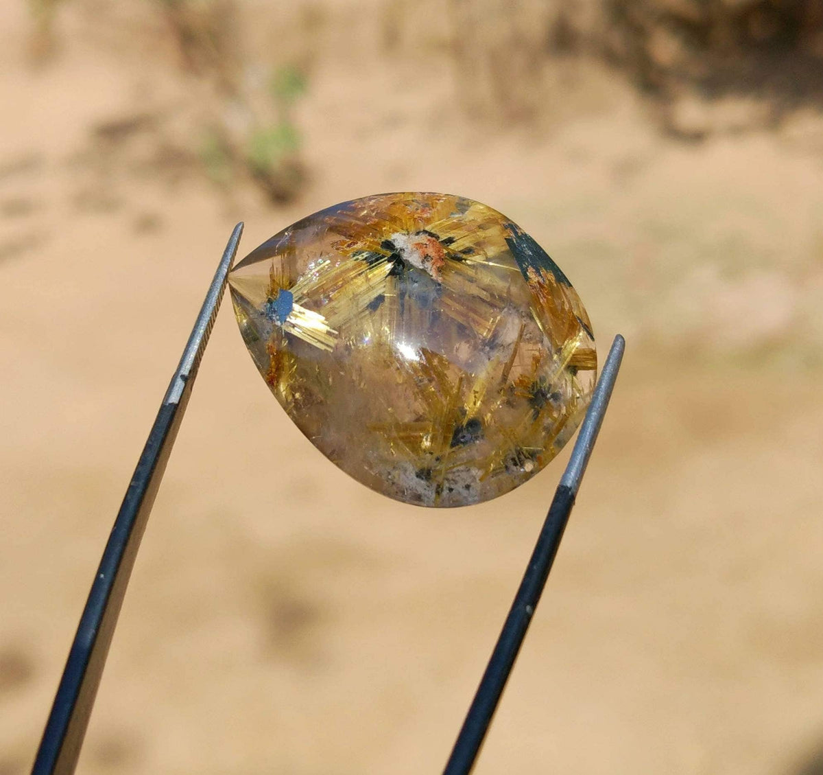 41 Carat Golden Rutile Quartz Cabochon (31x25 mm)