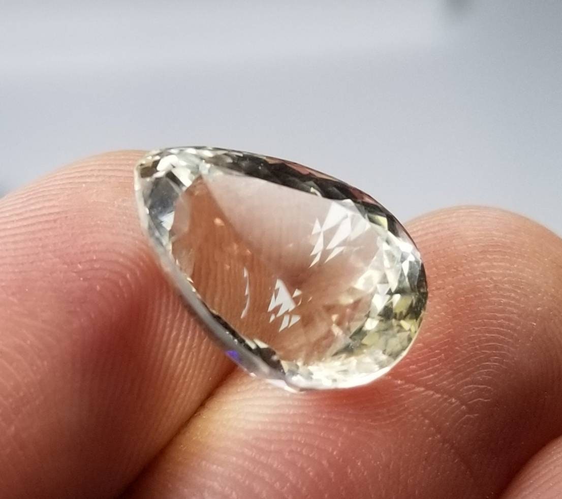 Natural good quality ring size faceted pear shape kunzite gem