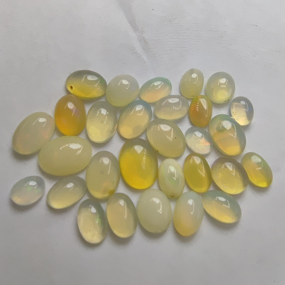 Natural small lot small sizes oval shapes fire opal Cabochons, 29 pieces, 10 carats