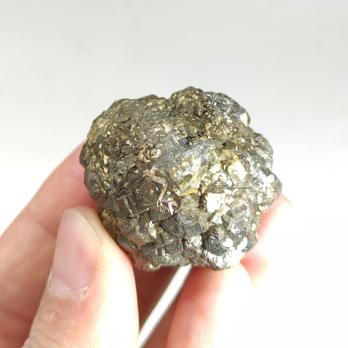 Natural golden Marcasite crystal with rainbow effect on surface from Pakistan, 77.7 grams