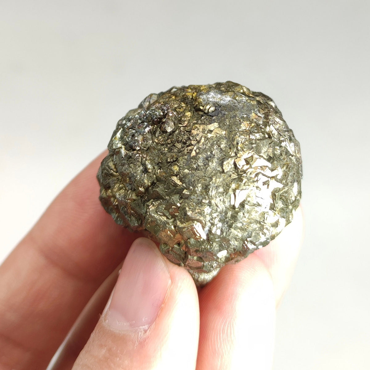 Natural golden Marcasite crystal with rainbow effect on surface from Pakistan, 77.7 grams