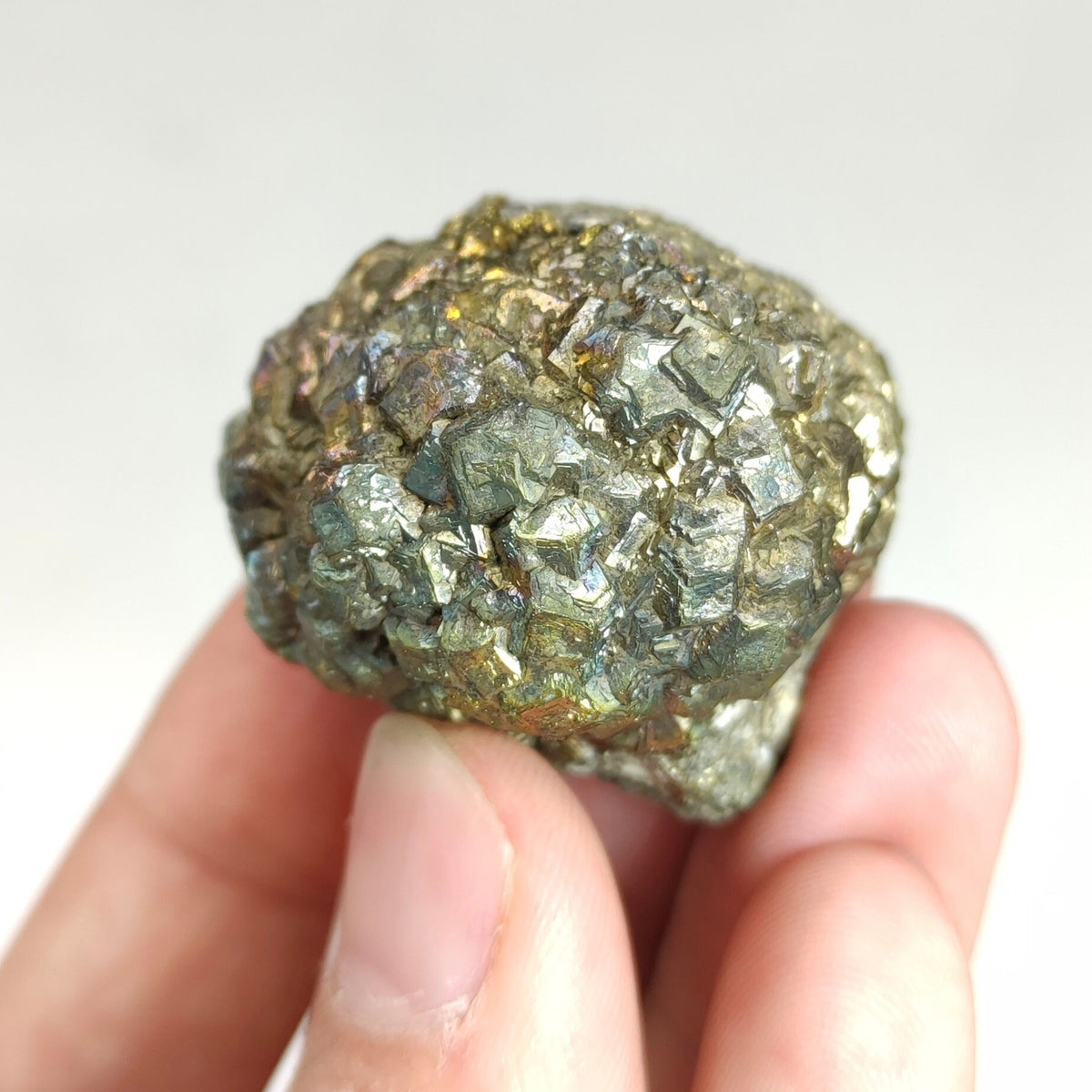 Natural golden Marcasite crystal with rainbow effect on surface from Pakistan, 77.7 grams