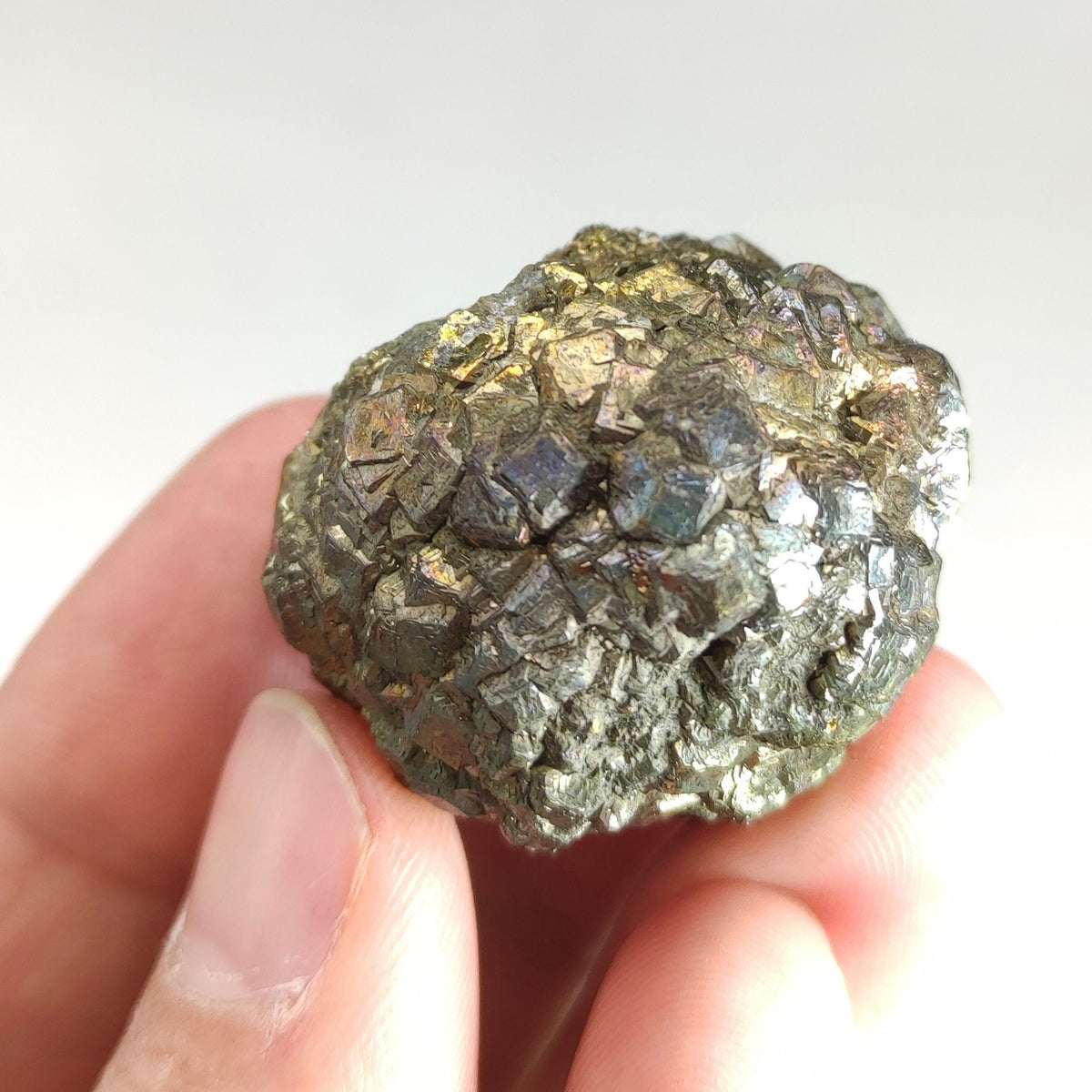 Natural golden Marcasite crystal with rainbow effect on surface from Pakistan, 77.7 grams