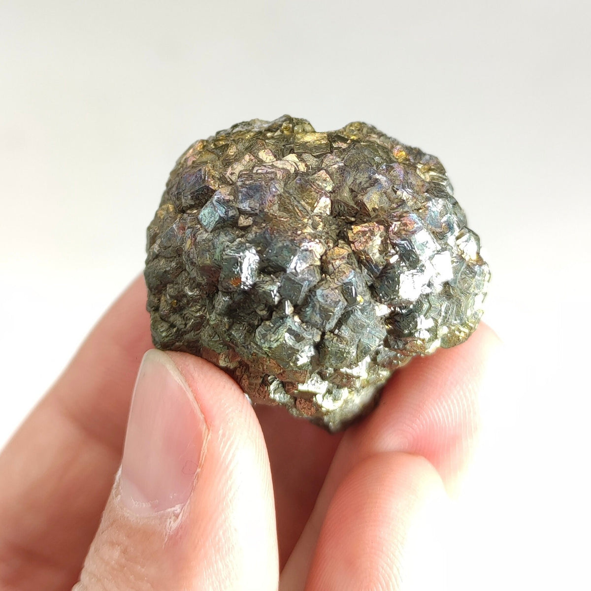 Natural golden Marcasite crystal with rainbow effect on surface from Pakistan, 77.7 grams