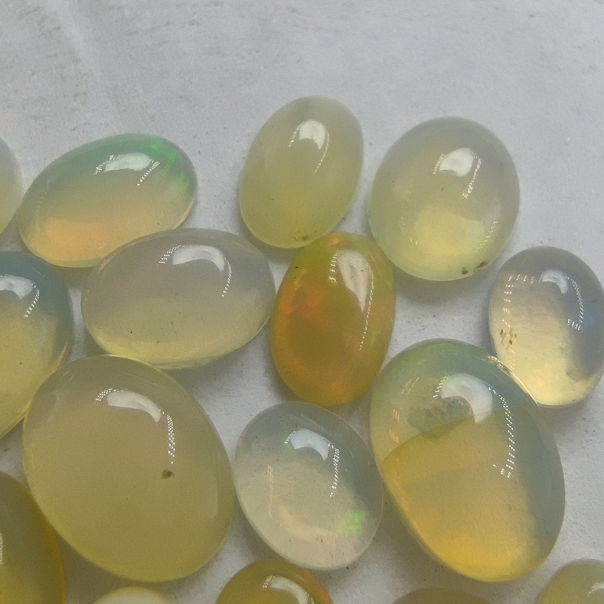 Natural small lot small sizes oval shapes fire opal Cabochons, 29 pieces, 10 carats