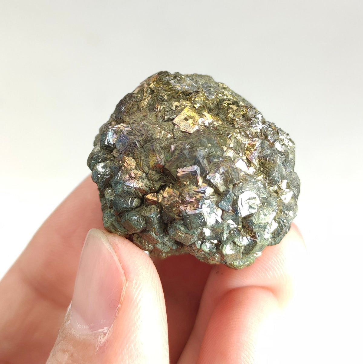 Natural golden Marcasite crystal with rainbow effect on surface from Pakistan, 77.7 grams
