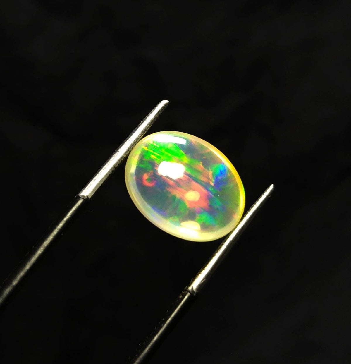 Natural 6 Carat Oval Fire Opal Cabochon