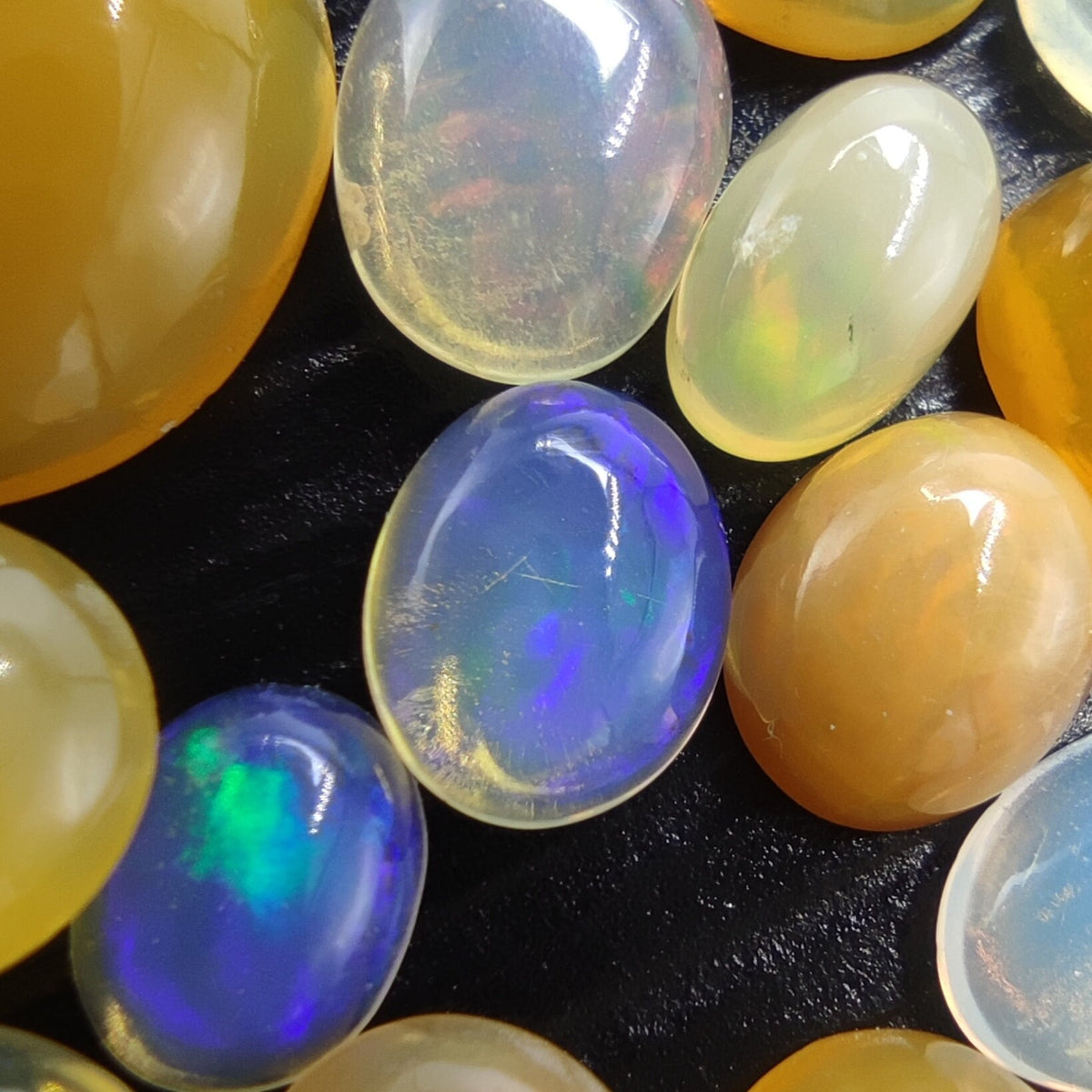 Natural small lot small sizes oval shapes fire opal Cabochons, 31 pieces, 10 carats