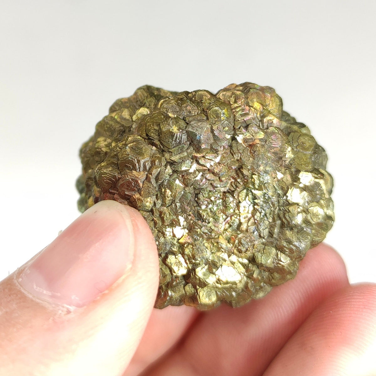 Natural golden Marcasite crystal with rainbow effect on surface from Pakistan, 80 grams
