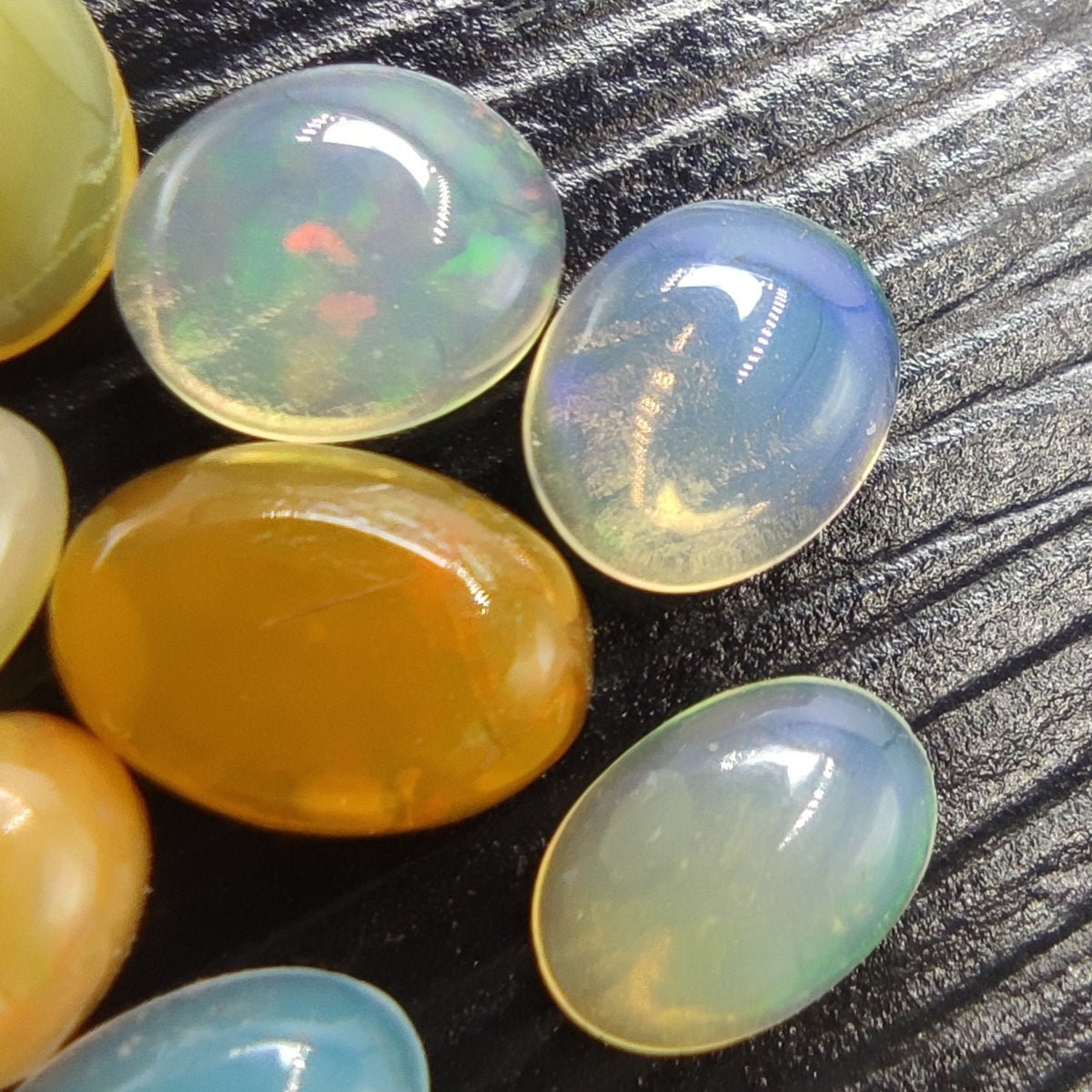 Natural small lot small sizes oval shapes fire opal Cabochons, 31 pieces, 10 carats