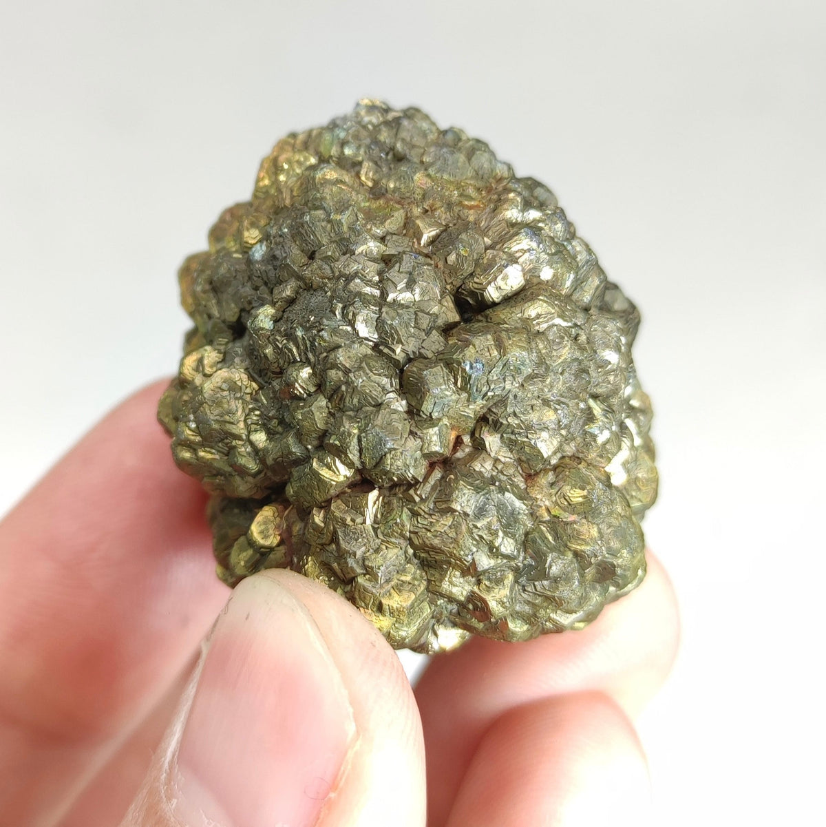 Natural golden Marcasite crystal with rainbow effect on surface from Pakistan, 80 grams