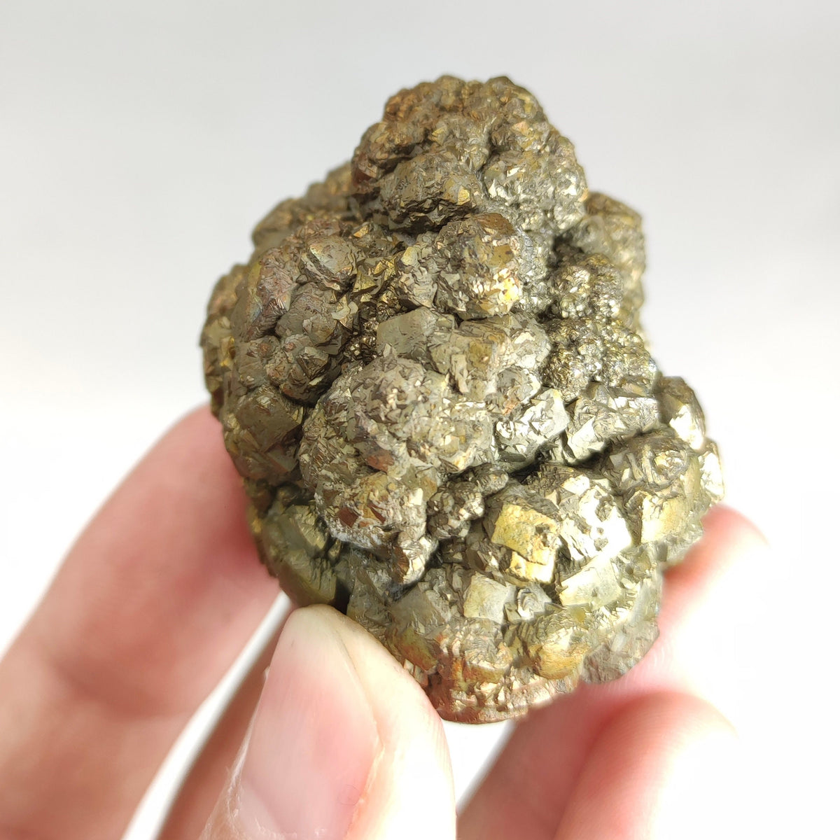 Natural golden Marcasite crystal with rainbow effect on surface from Pakistan, 125 grams