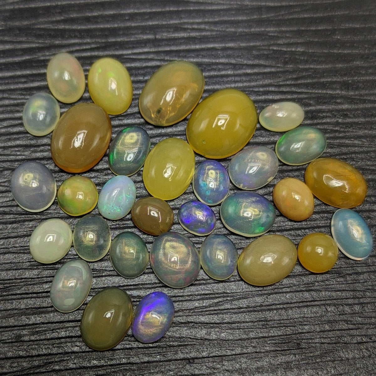 Natural small lot small sizes oval shapes fire opal Cabochons, 31 pieces, 10 carats