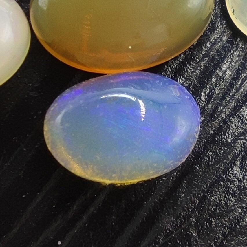 Natural small lot small sizes oval shapes fire opal Cabochons, 31 pieces, 10 carats
