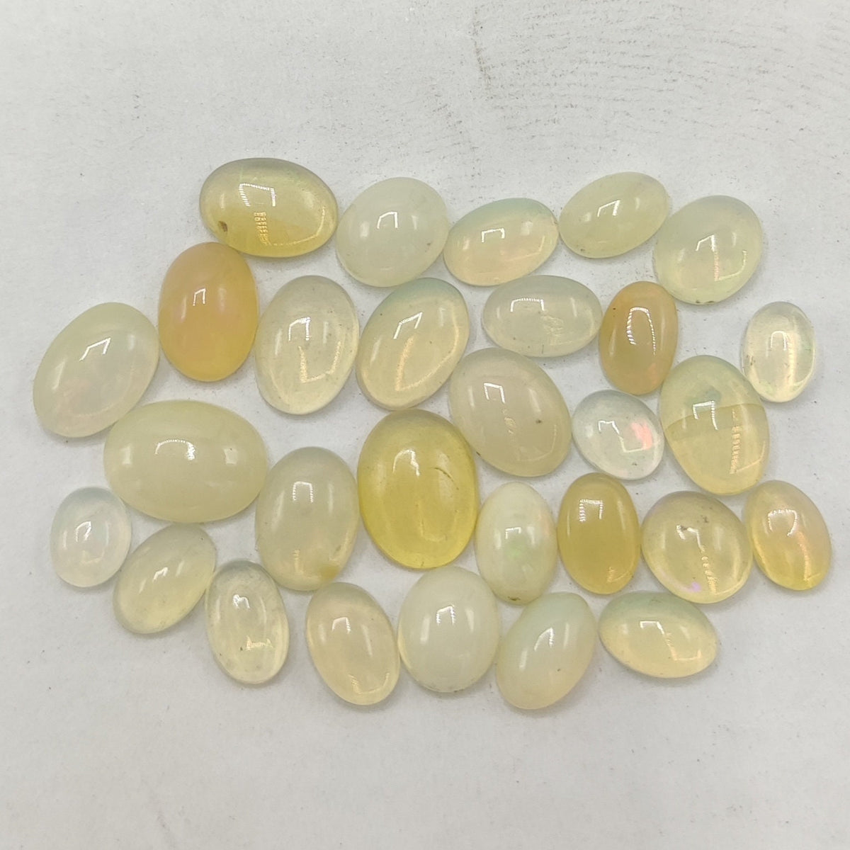Natural small lot small sizes oval shapes fire opal Cabochons, 29 pieces, 10 carats