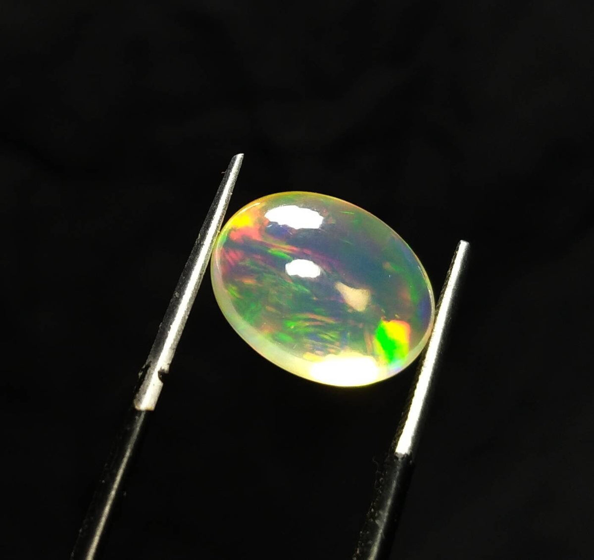 Natural 6 Carat Oval Fire Opal Cabochon