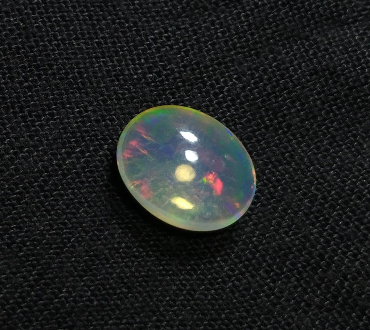 Natural 6 Carat Oval Fire Opal Cabochon